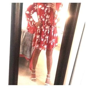 Orange and white shirt dress with embroidery.